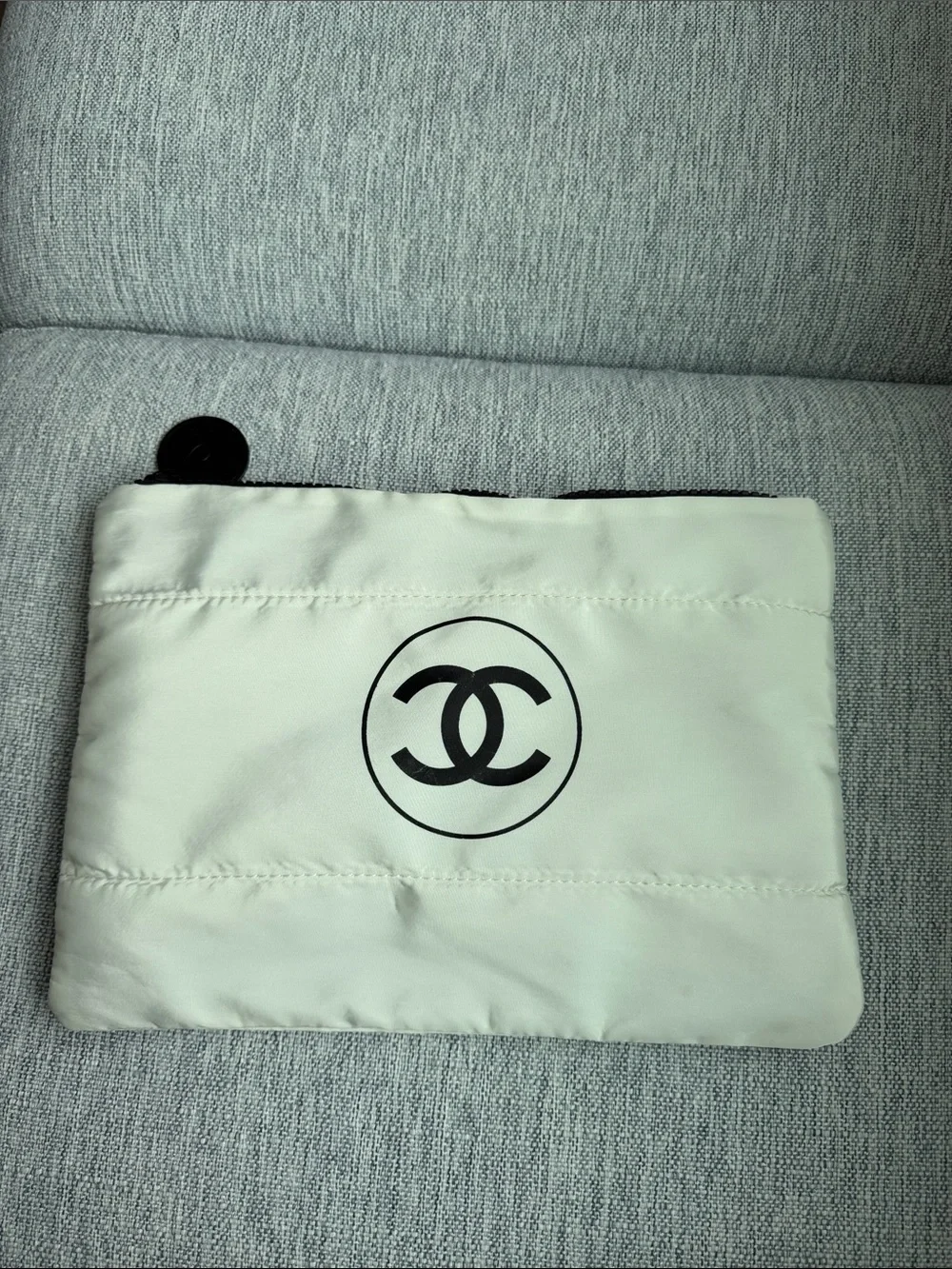 CHANEL Cream Quilted Pouch with Black Logo